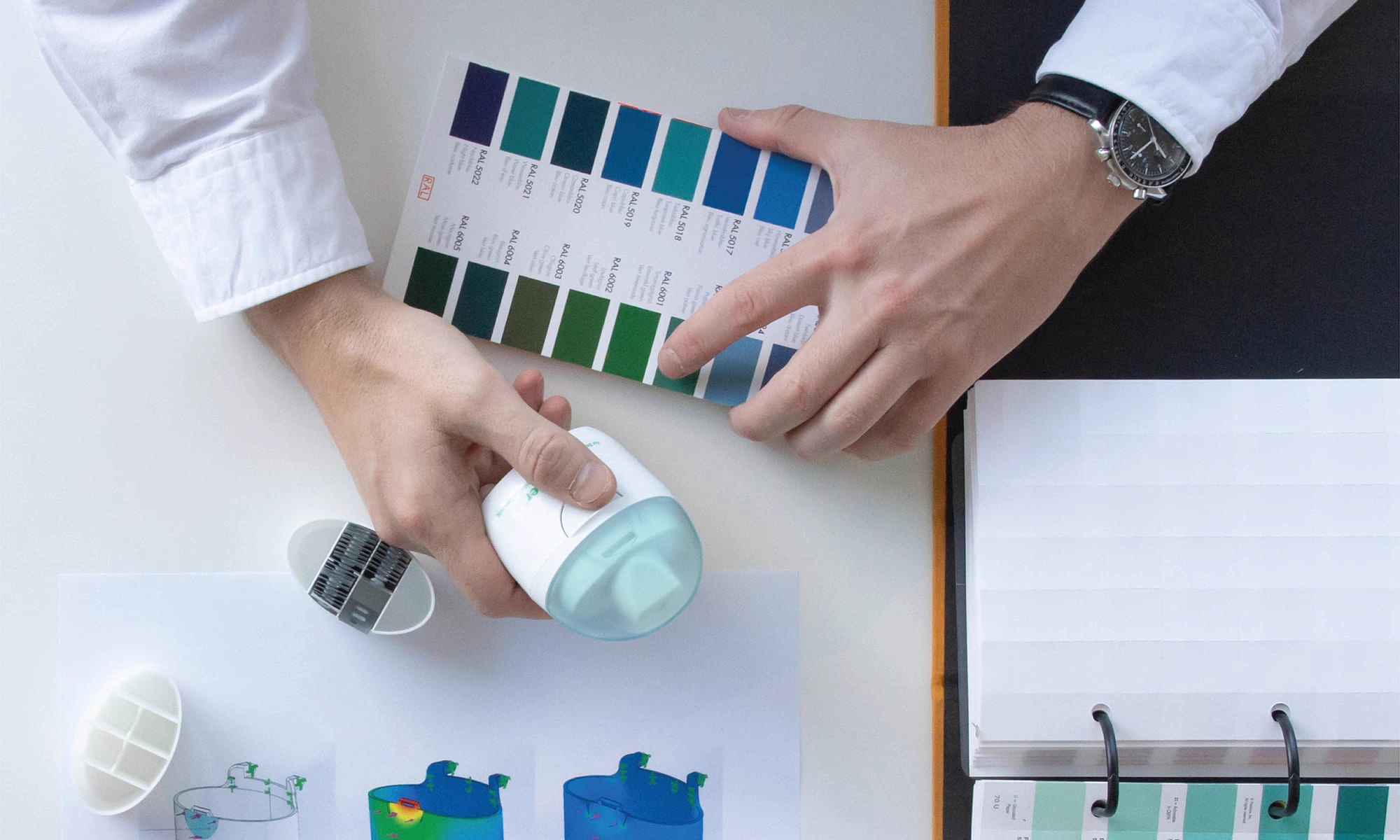 Prototypes and colour samples being reviewed
