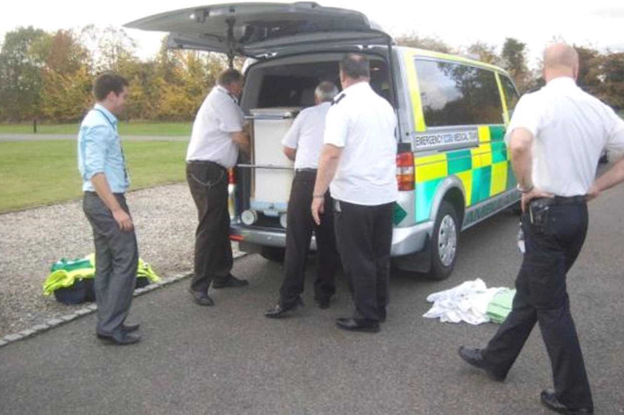 Loading the mock-up into an ambulance