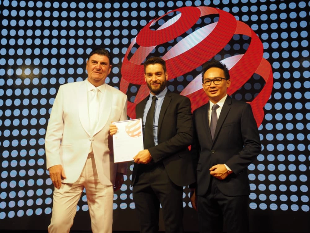 Receiving the Red Dot award in Singapore