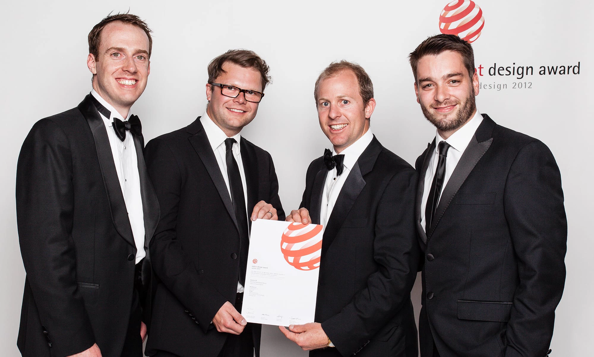 The team receiving the 2012 Red Dot award